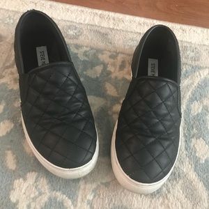 Steve Madden black leather slip ons